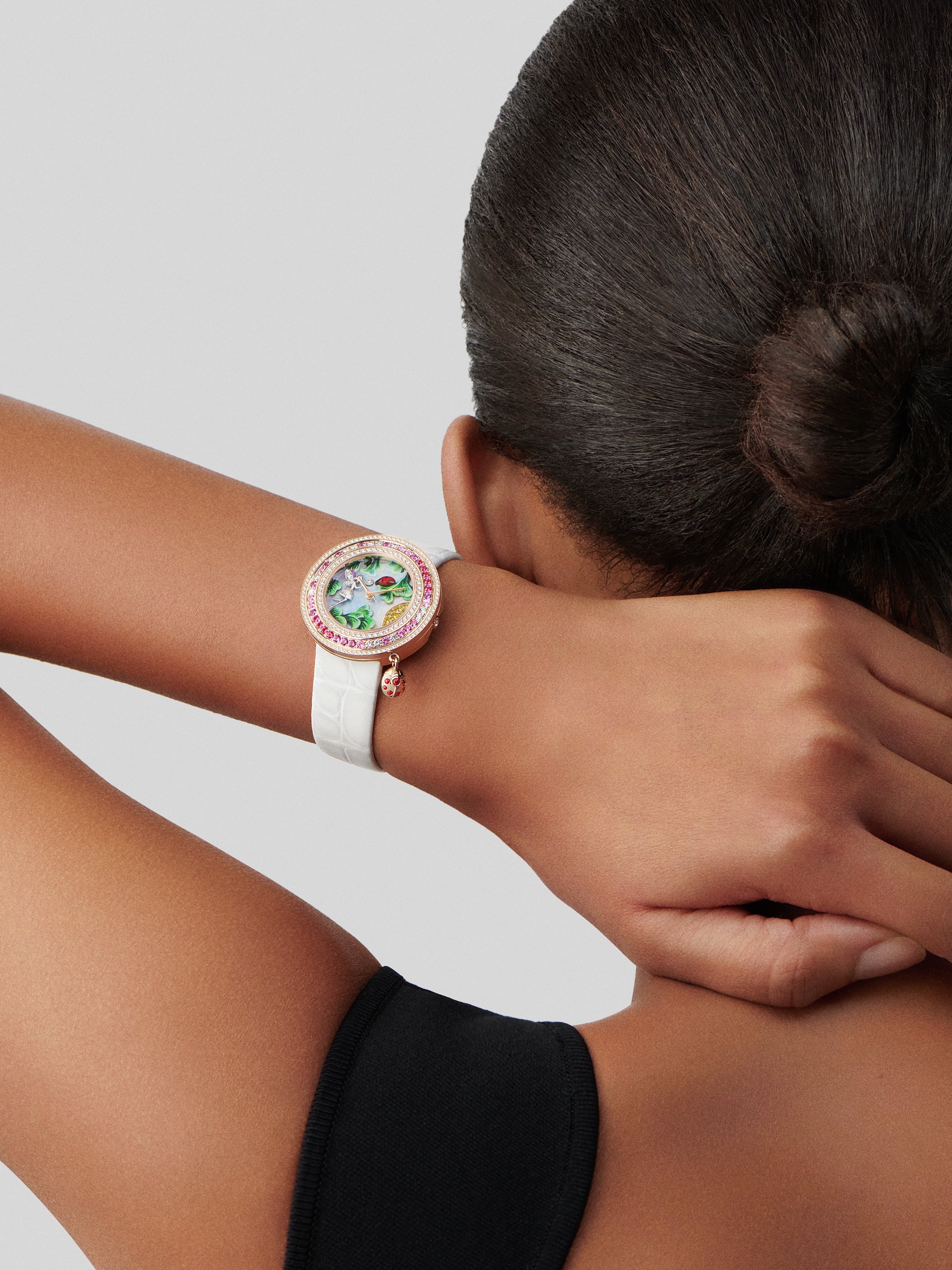 Charms Coccinelle Féerique watch, 18K rose gold, Diamond:  229 stones,  1.23 carats, Mother-of-pearl:  1 stone, Ruby:  7 stones,  0.06 carat, Sapphire:  45 stones,  1.06 carats, Worn Detail, Watch - Van Cleef & Arpels